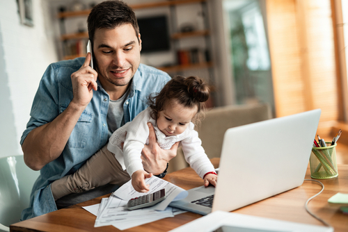 Man working from home with child